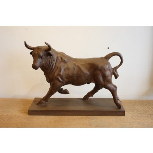 Contemporary cast iron model of “The Raging Bull"