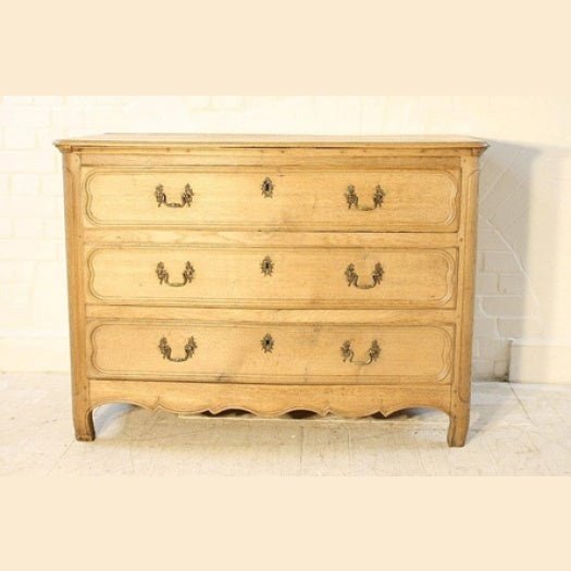 Early 19th century French oak commode with panelled ends