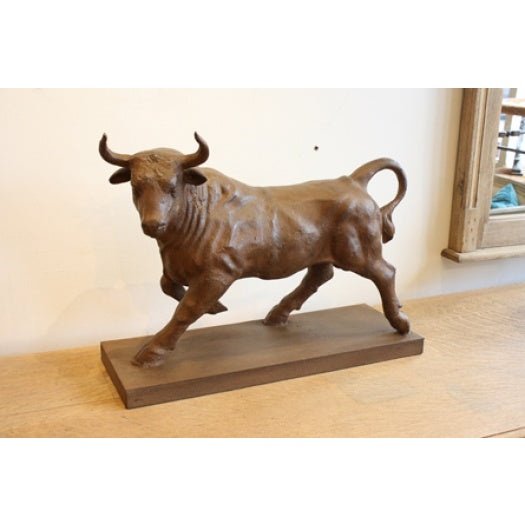 Contemporary cast iron model of “The Raging Bull"