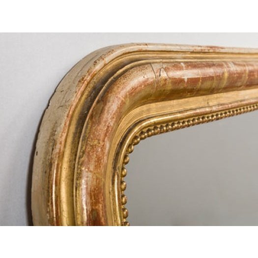 Late 19th century French gilt wall mirror later glass