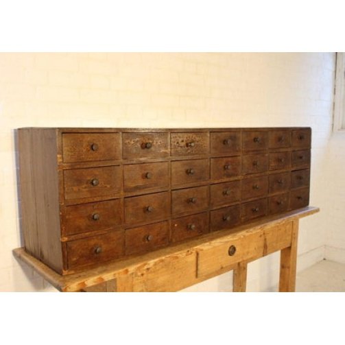 Large set of painted pine apothecary / seed drawers