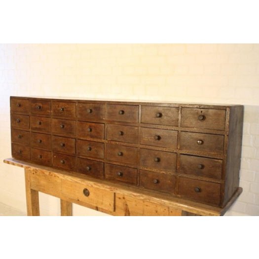 Large set of painted pine apothecary / seed drawers