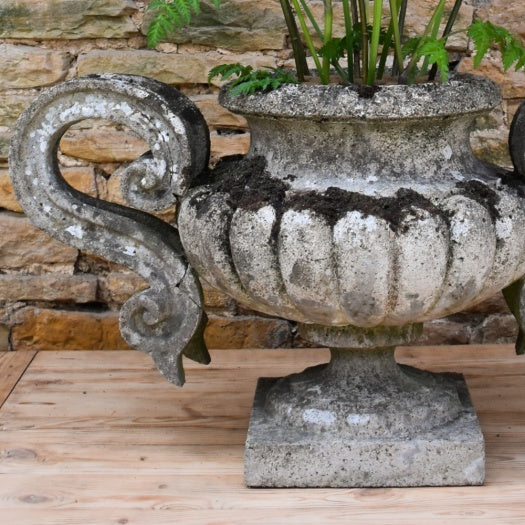 Pair of Weathered Urns