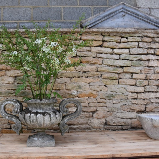 Pair of Weathered Urns