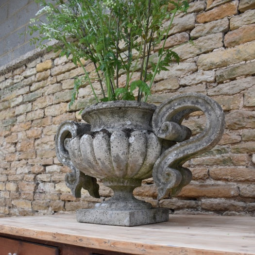 Pair of Weathered Urns