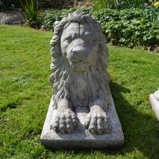 Pair of Recumbent Composition Lions